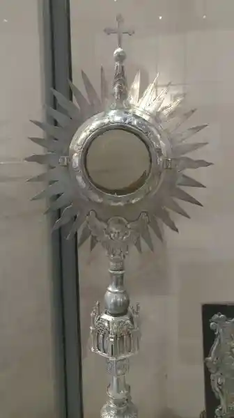 Monstrance, sun symbol with cross on top